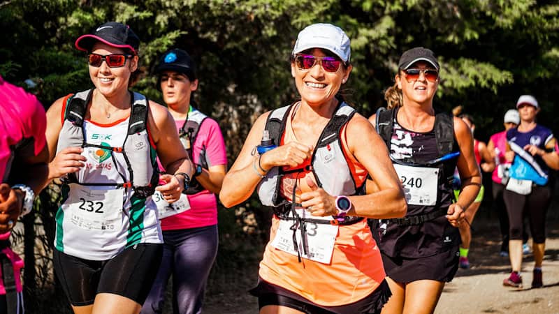 Runners in a race with their essential running gear for marathon runners, including shoes and apparel.